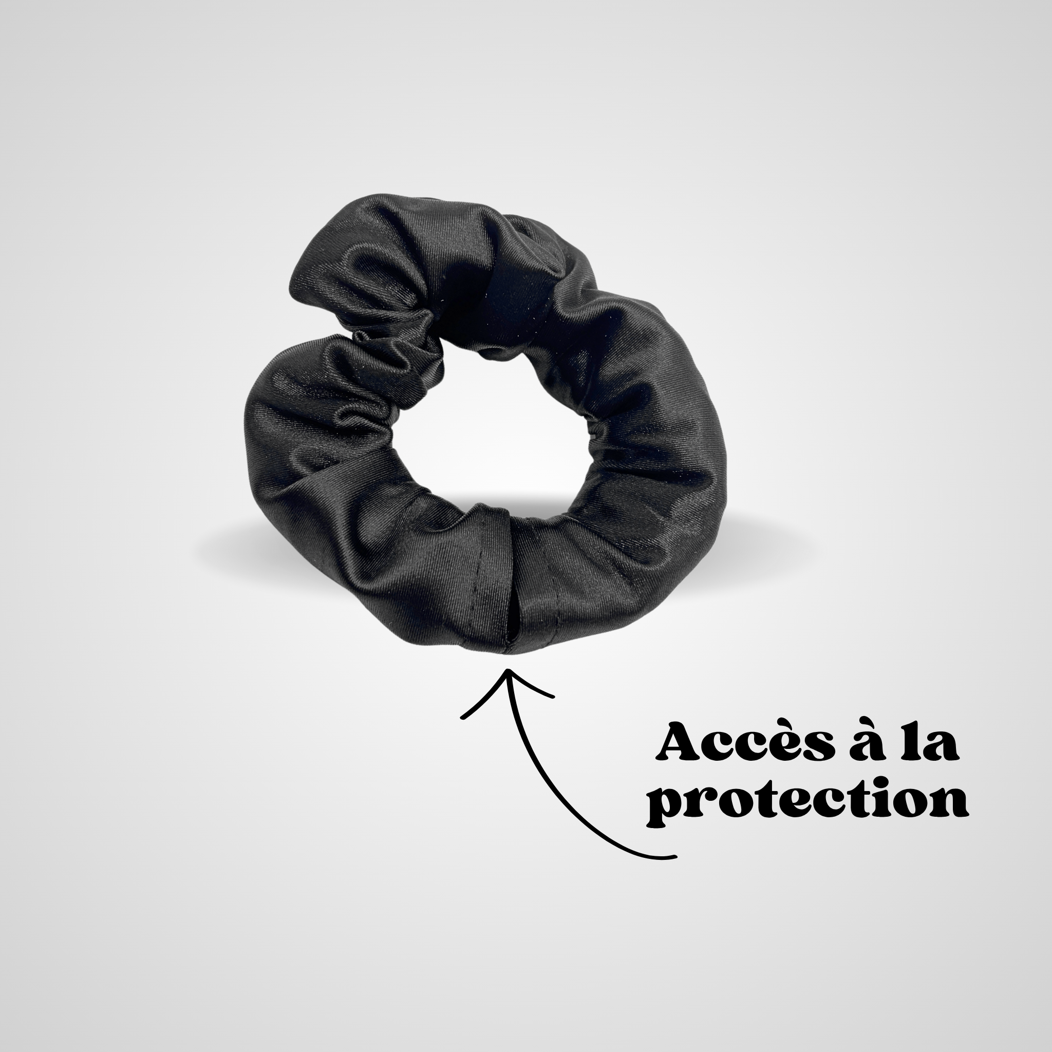 Chouchou anti-drogue noir satiné montrant l’accès à la protection de verre intégrée