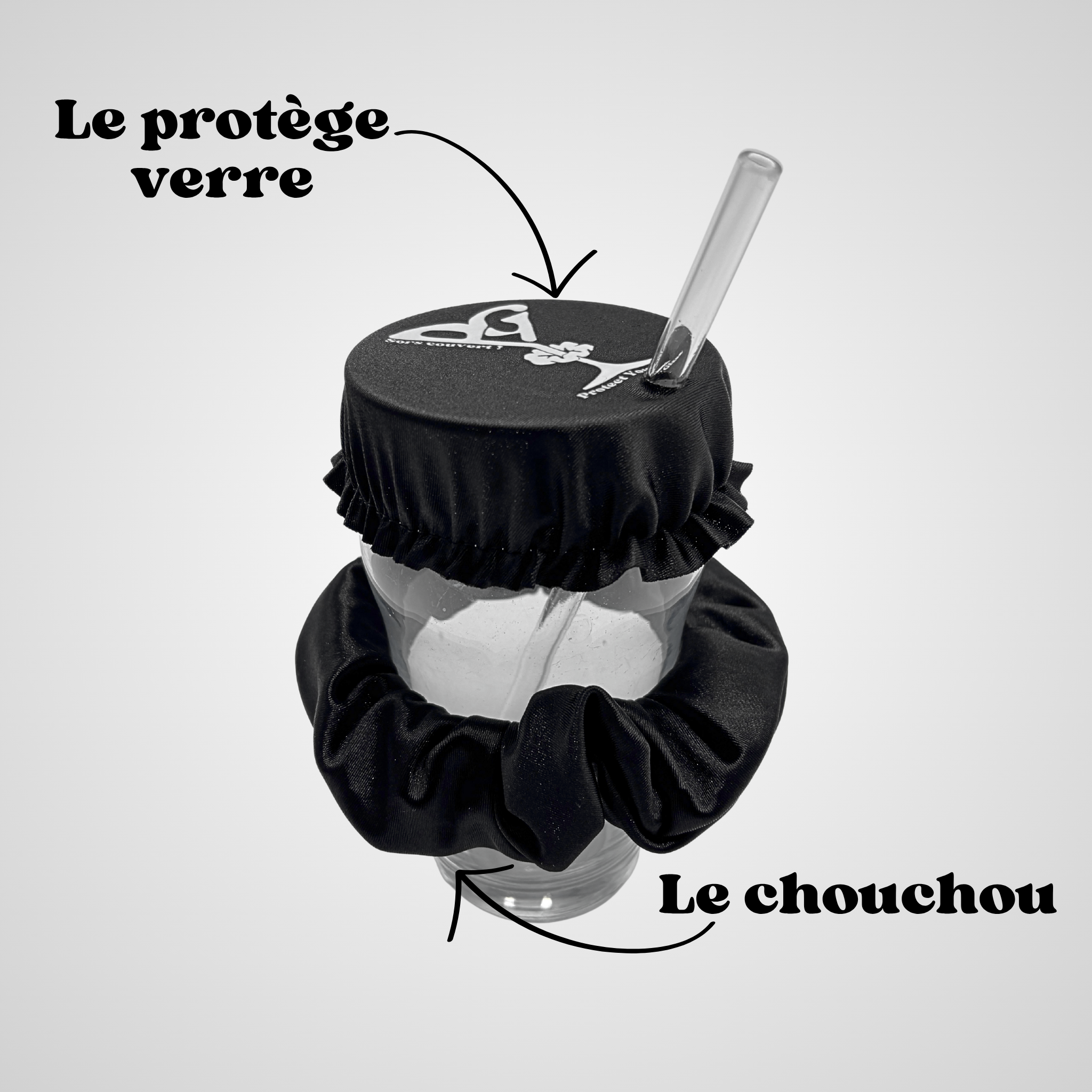 Chouchou anti-drogue noir satiné Protect Your Glass installé sur un verre pour protéger la boisson