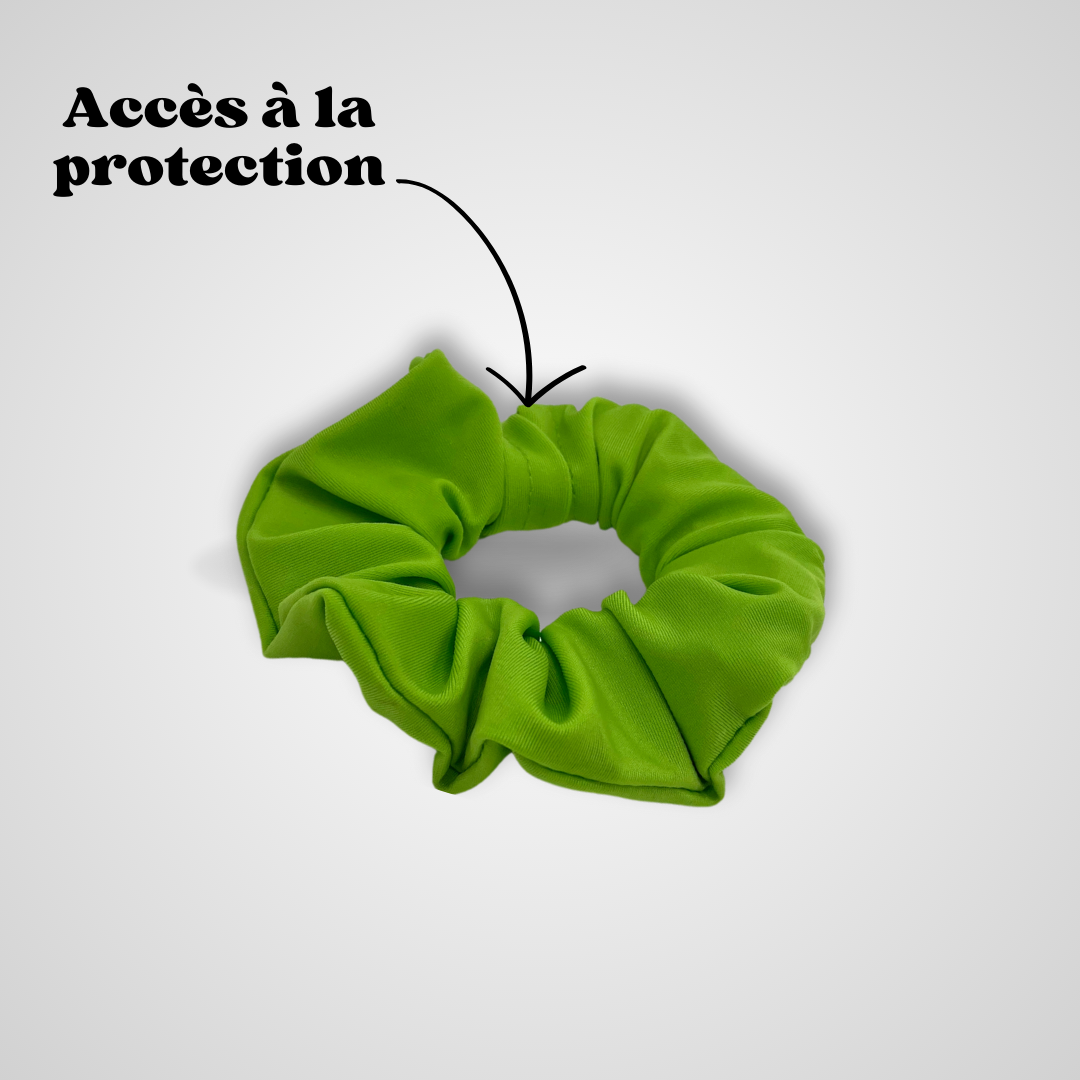 Chouchou vert clair Protect Your Glass refermé sur lui-même, fond gris