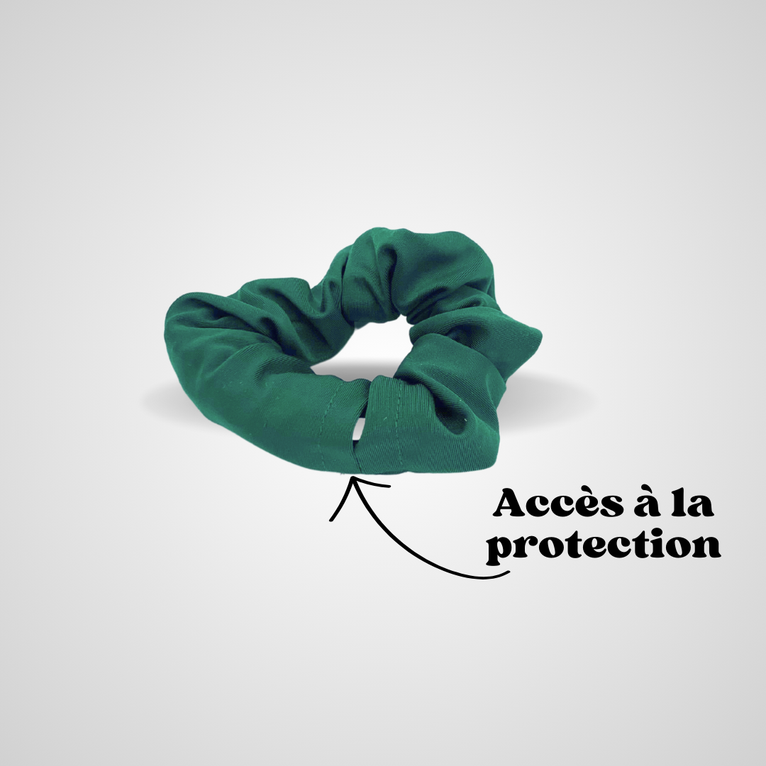 Chouchou vert foncé Protect Your Glass refermé sur lui-même, fond gris