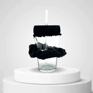 Black Protect Your Glass anti-spiking scrunchie fitted over a drink