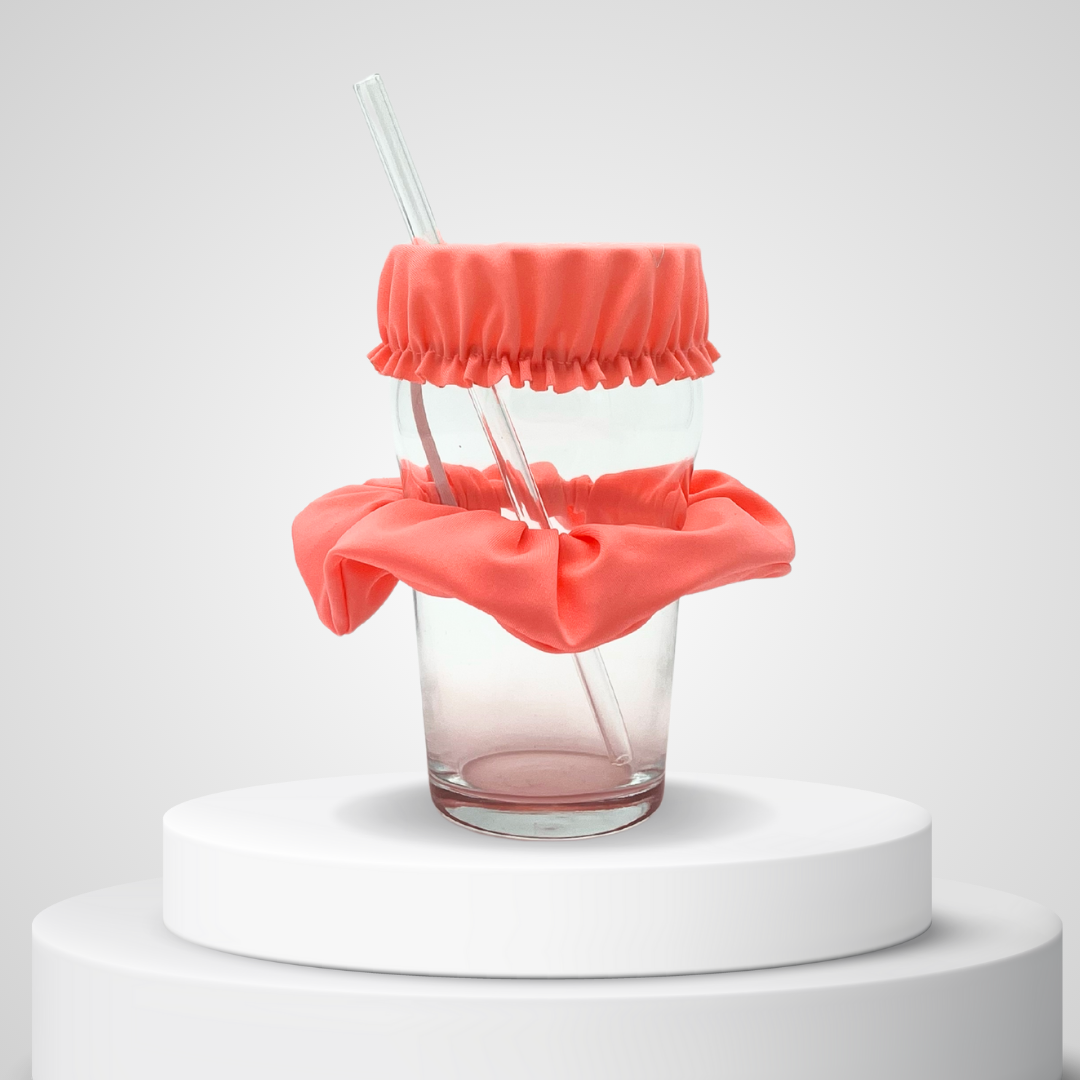 Chouchou rose anti-drogue présenté en packshot sur fond gris